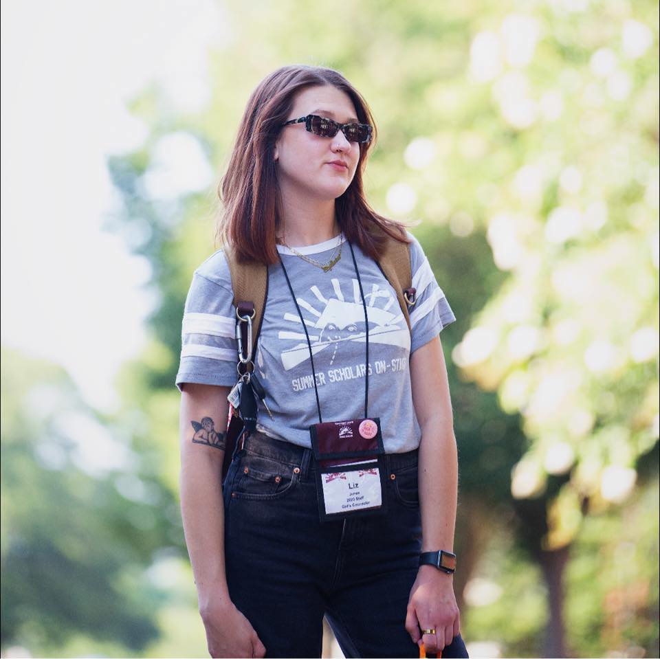 A person wearing a backpack and sunglasses  AI-generated content may be incorrect.